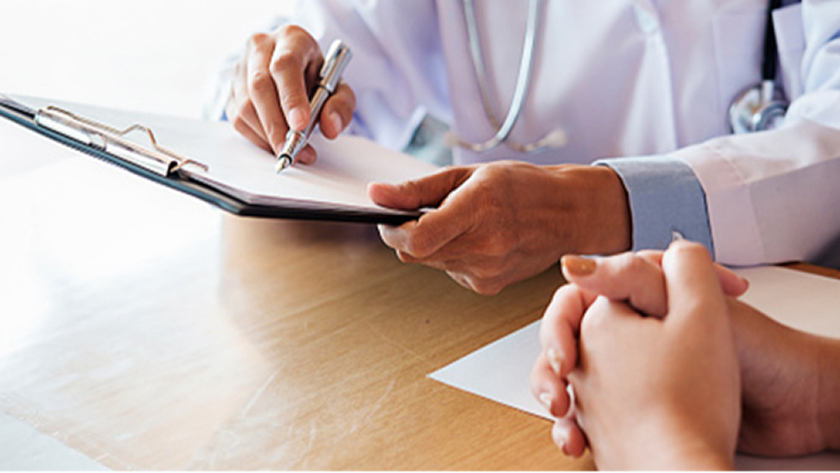 Doctor writing notes