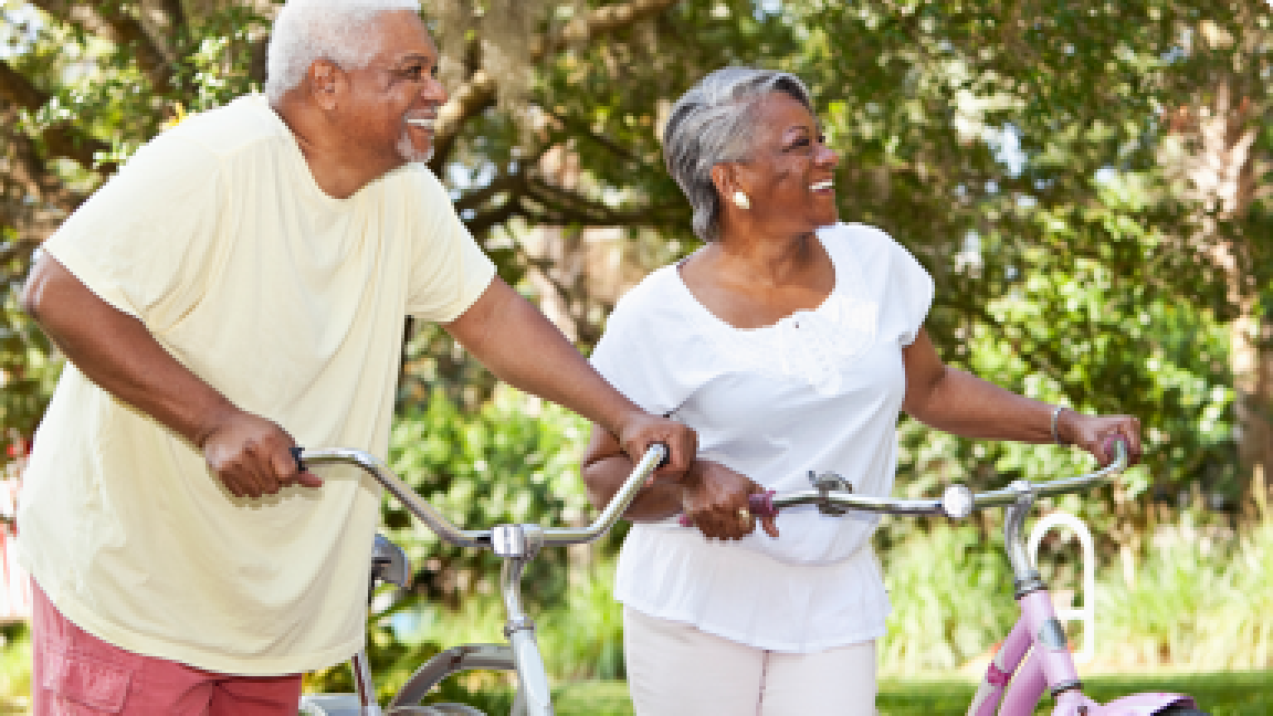 senior couple riding bicycles