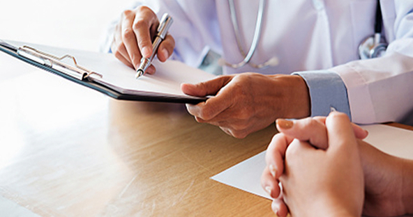 Doctor writing notes